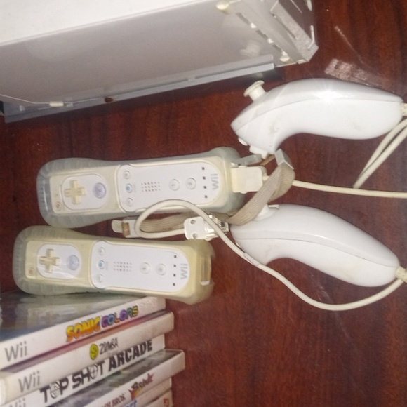 Nintendo Wii with two controllers and nunchucks and 10 games